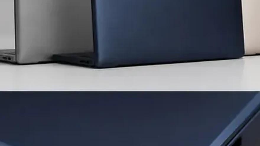 Several distinct closed laptops arranged in a row on a table, each a different colour
